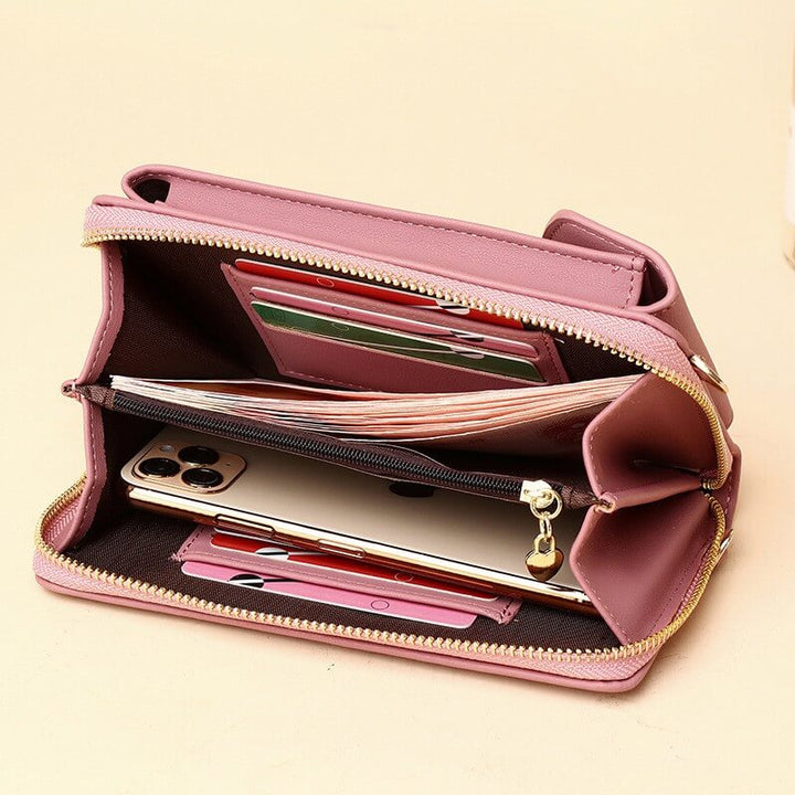 Elegant crossbody taske med guldfarvede beslag og justerbar rem, ideel til hverdagsbrug og festlige lejligheder.