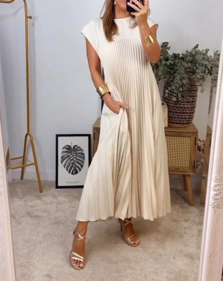 Elegant dame festkjole med V-udskæring. Perfekt til bryllup, aften og formelle anledninger.