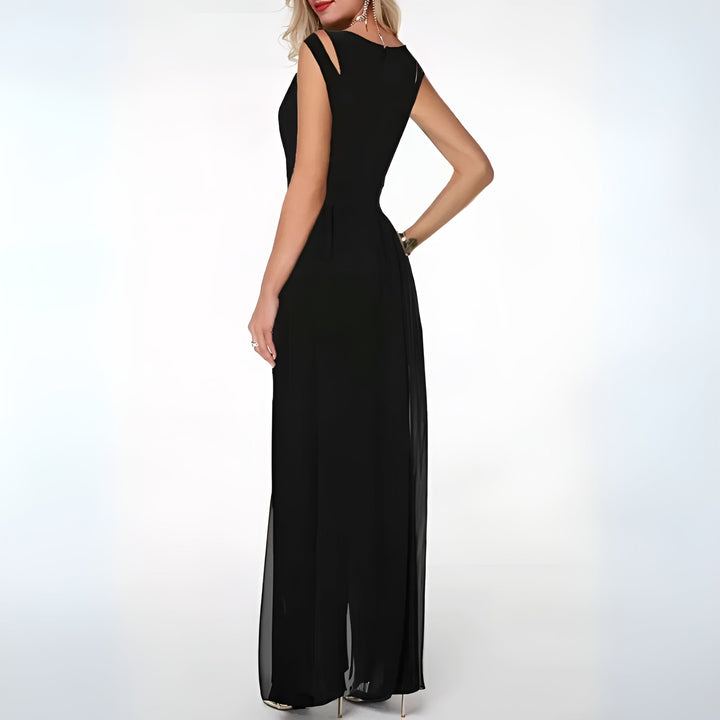 Komfortabel casual heldragt til kvinder, sort dame jumpsuit med afslappet pasform til hverdagsmode.
