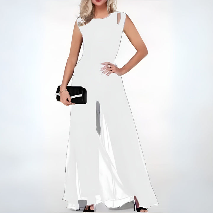 Dame heldragt til kontoret, sort elegant jumpsuit der kombinerer professionel stil og komfort til hverdagsbrug.