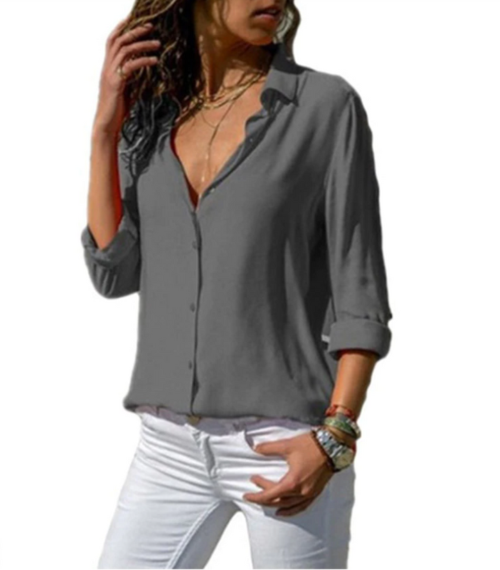 Dame mode: elegant langærmet skjorte, en alsidig og komfortabel bluse til kvinder.