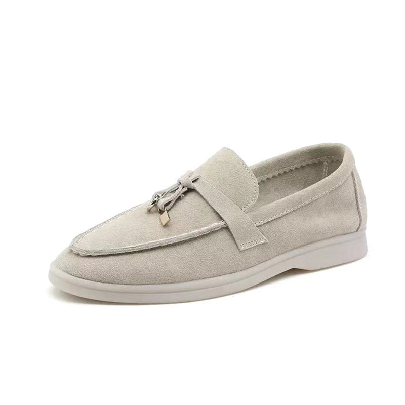 Klassiske brune dame loafers med spids tå; elegante og flade for optimal komfort hele dagen.
