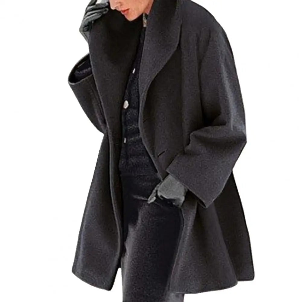Varm og elegant damefrakke, oversized med høj krave. Komfortabel vinterstil for kvinder.
