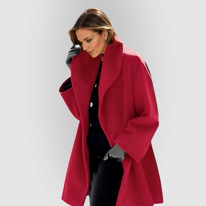 Stilfuld dame vinterfrakke med høj krave og oversized pasform. Elegant overtøj til kvinder.