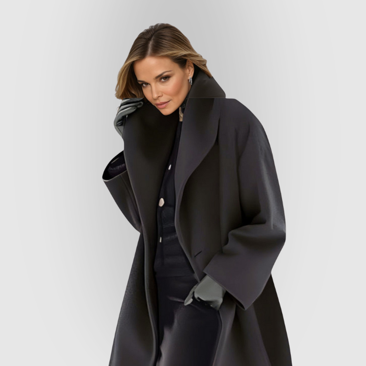 Tidløs elegant damefrakke, oversized model med varm høj krave. Komfortabel vinterstil.