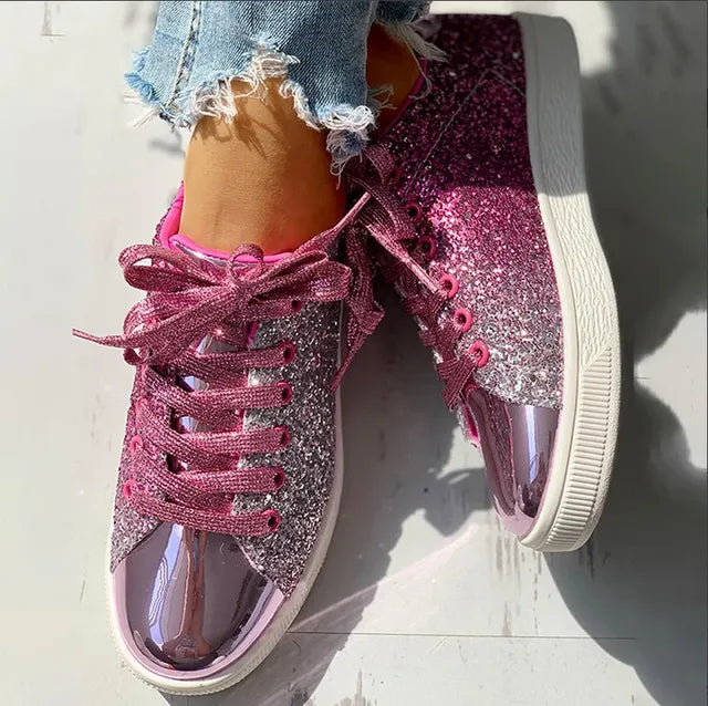 "Elegant glimmer damesko med sporty look, ideel til hverdag og fest; luksuriøst design med høj komfort."