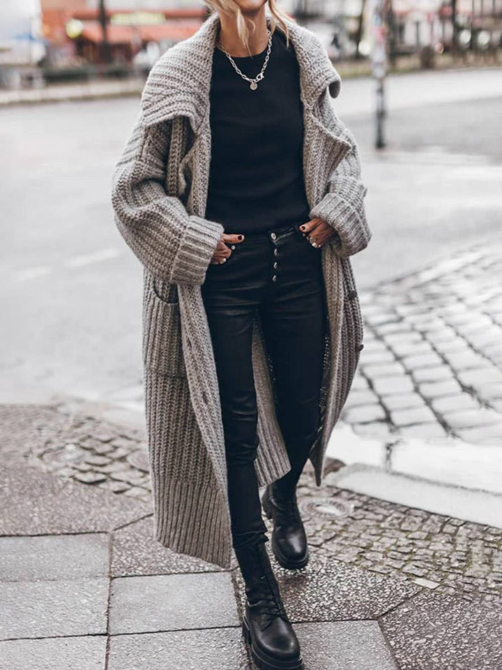 Afslappet sort kvinde cardigan, langærmet og komfortabel, med knapper, ideel til casual stil.