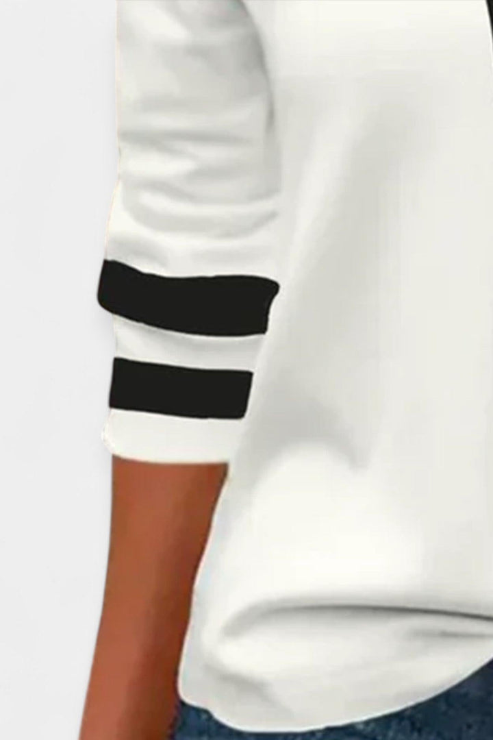 Kvinders sporty hvide bluse med lynlås, en langærmet og elegant top til afslappet hverdagsmode.