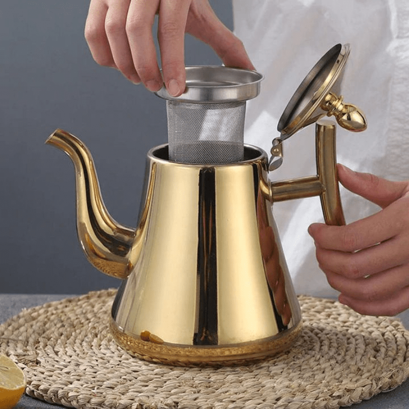 Sølvfarvet induktionsfilterkedel i rustfrit stål, ideel til te og kaffe i det moderne køkken.