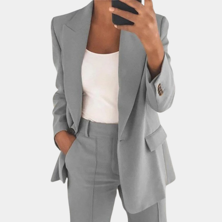 Kvinders stilfulde blazer i grå; moderne design til både hverdag og fest.