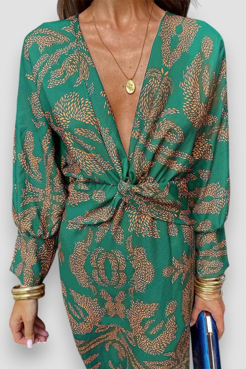 Kvinders festkjole: Elegant midikjole med mønster, V-hals og twist-front. Perfekt til en stilfuld aften.