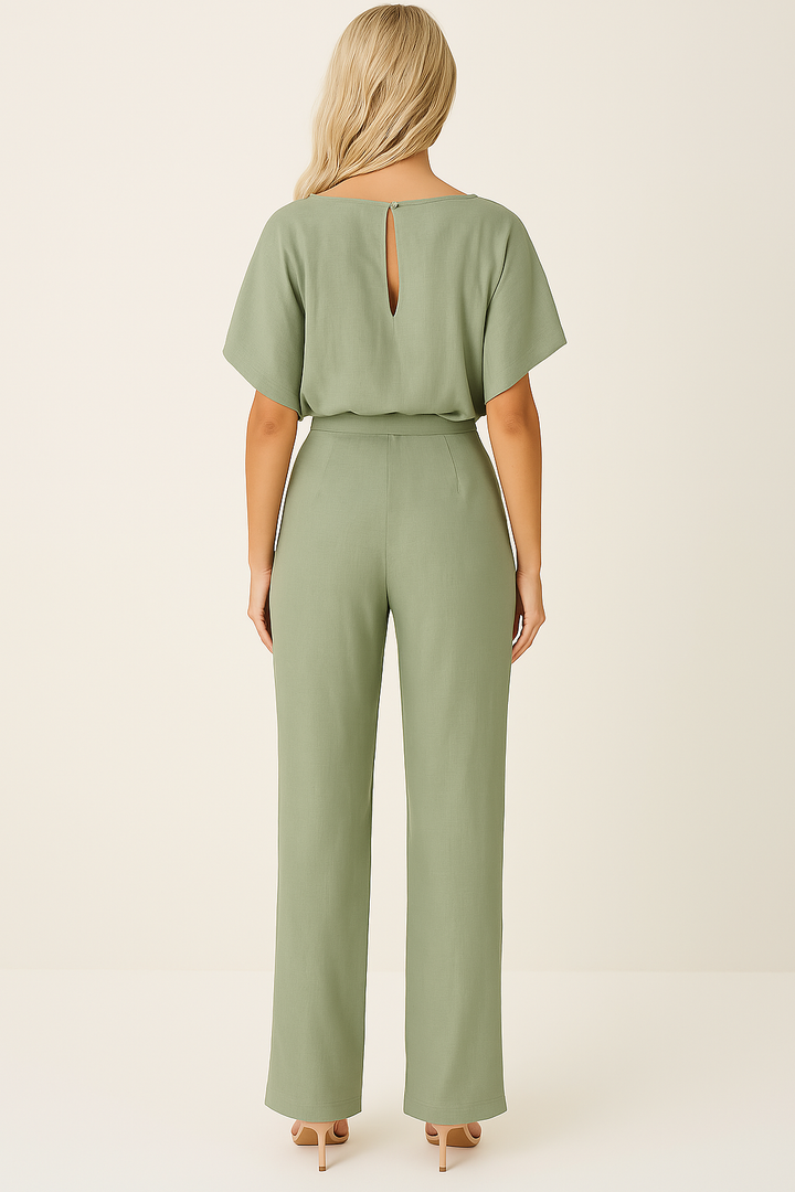 Alsidig dame jumpsuit i flydende stof, nem at style til både hverdag og fest.