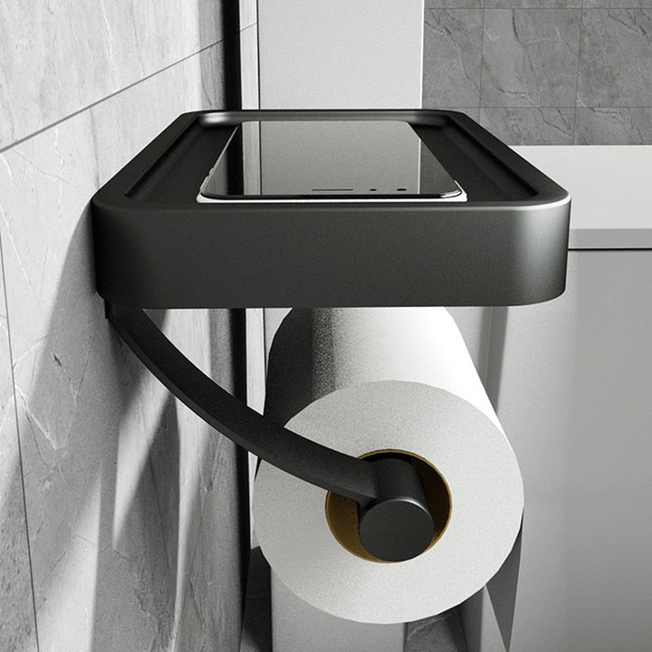 Hvid vægmonteret toiletpapirholder med integreret hylde for ekstra opbevaring på badeværelset, smart design.