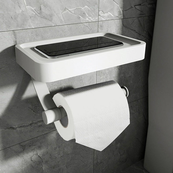 Stilfuld vægmonteret toiletpapirholder med hylde i sort til badeværelsesopbevaring, elegant og funktionel løsning.