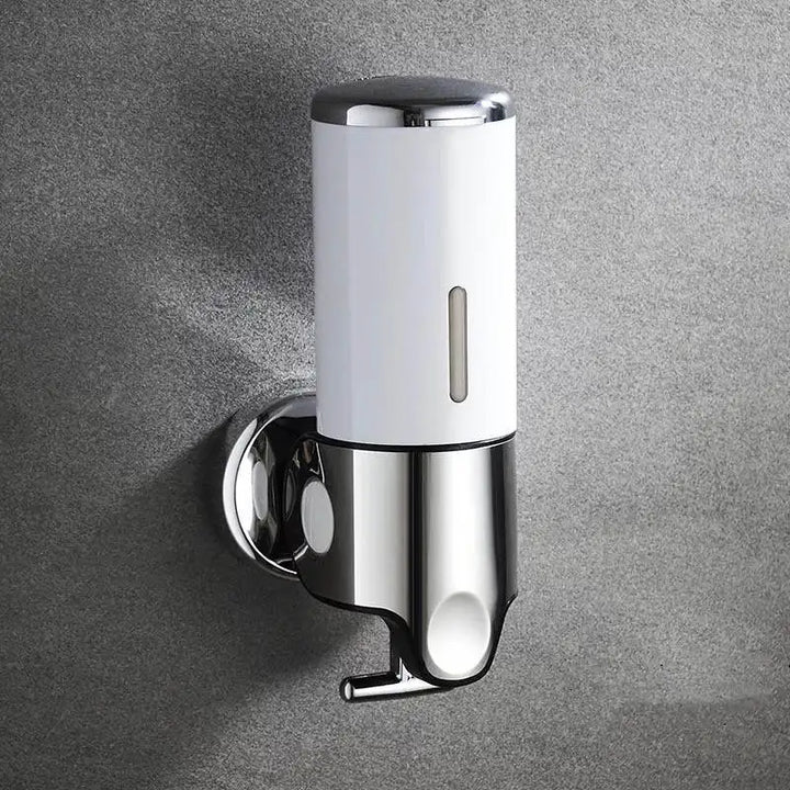 "Elegant vægmonteret sæbedispenser med dobbelt rum, minimalistisk design, gennemsigtige sektioner for nemt overblik."