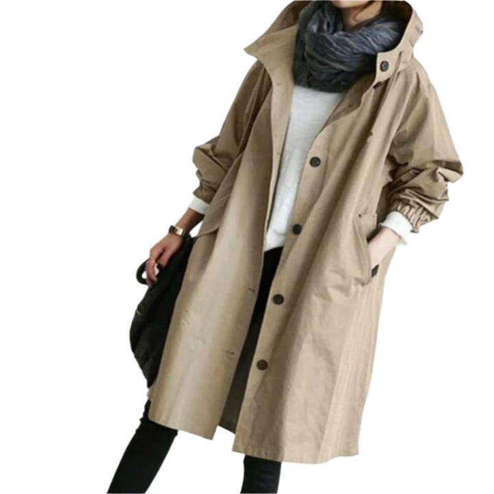 Elegant, vandafvisende trenchcoat til kvinder i klassisk design, med bælte og lommer, velegnet til overgangsvejr.