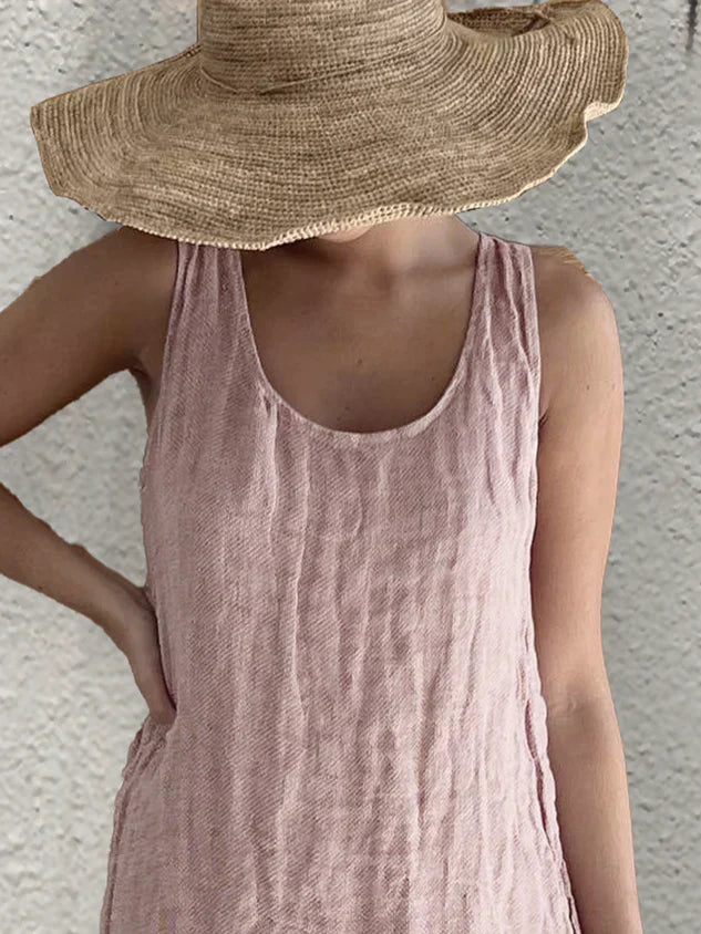 "Elegante Stilla sommerkjole i bomuld-linned, løstsiddende pasform, rund hals, ærmeløs til afslapning og stil."