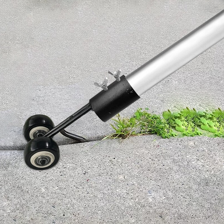 "Ergonomisk ukrudtsfjerner i robust metal med grønt håndtag, perfekt til effektivt havearbejde uden besvær."