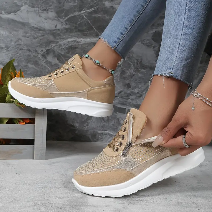 "Ergonomiske kvinde-sneakers med moderne design, åndbare materialer og optimal støtte, perfekt til daglig brug."