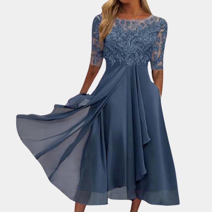 Elegant Felicia sommerkjole i lyserød til kvinder, let og stilfuld med sofistikeret design, ideel til både formelle og afslappede lejligheder.