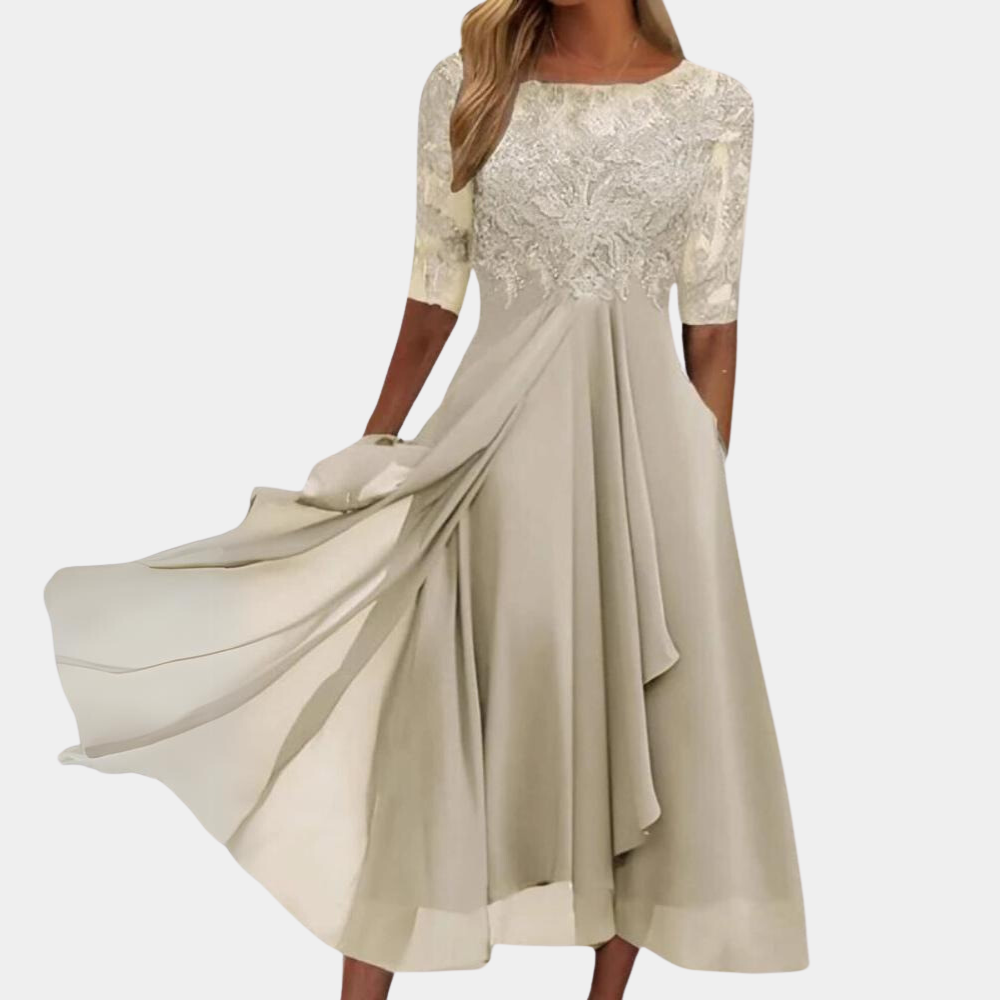 Elegant Felicia sommerkjole i lyserød til kvinder, let og stilfuld med sofistikeret design, ideel til både formelle og afslappede lejligheder.