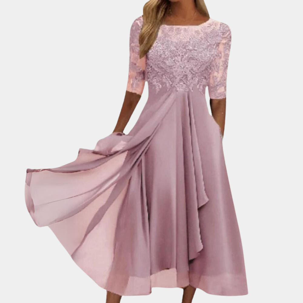 Elegant Felicia sommerkjole i lyserød til kvinder, let og stilfuld med sofistikeret design, ideel til både formelle og afslappede lejligheder.
