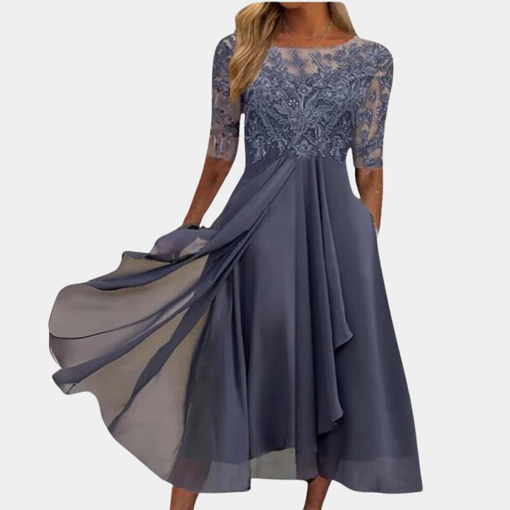 Elegant Felicia sommerkjole i lyserød til kvinder, let og stilfuld med sofistikeret design, ideel til både formelle og afslappede lejligheder.