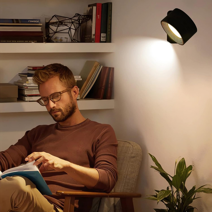 "Flexlight 360° trådløs væglampe; hvid, stilfuld design, USB-opladning, drejbar for fleksibel belysning i hjemmet."