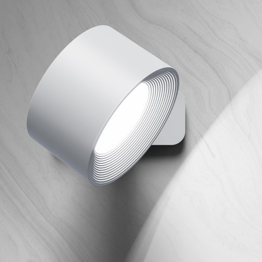 "Flexlight 360° trådløs væglampe; hvid, stilfuld design, USB-opladning, drejbar for fleksibel belysning i hjemmet."