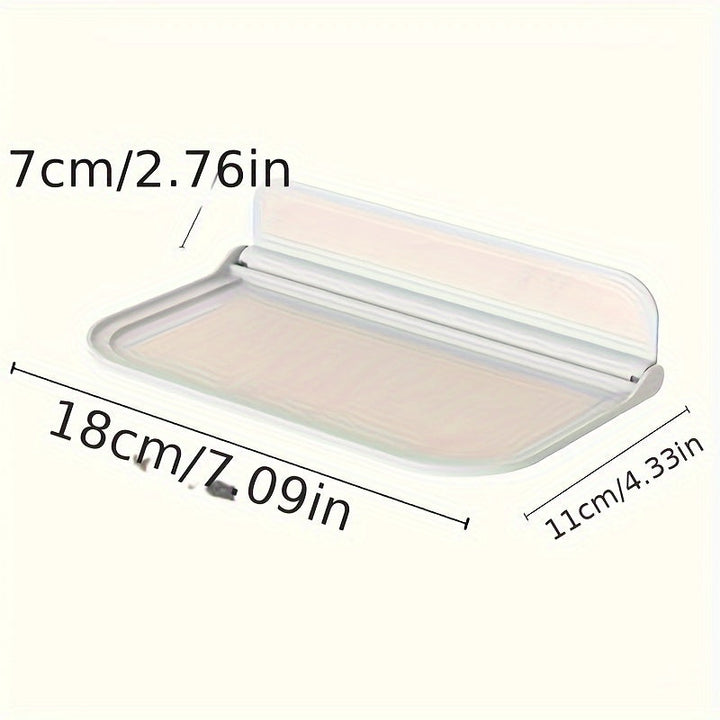 Foldbar væghylde i minimalistisk design, ingen boring nødvendig, perfekt til badeværelse og køkken, pladsbesparende.