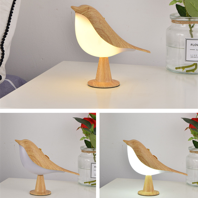 Genopladelig fugleformet natlampe i Ahorn, marmor eller rød med LED belysning, perfekt til stilfuld boligindretning.