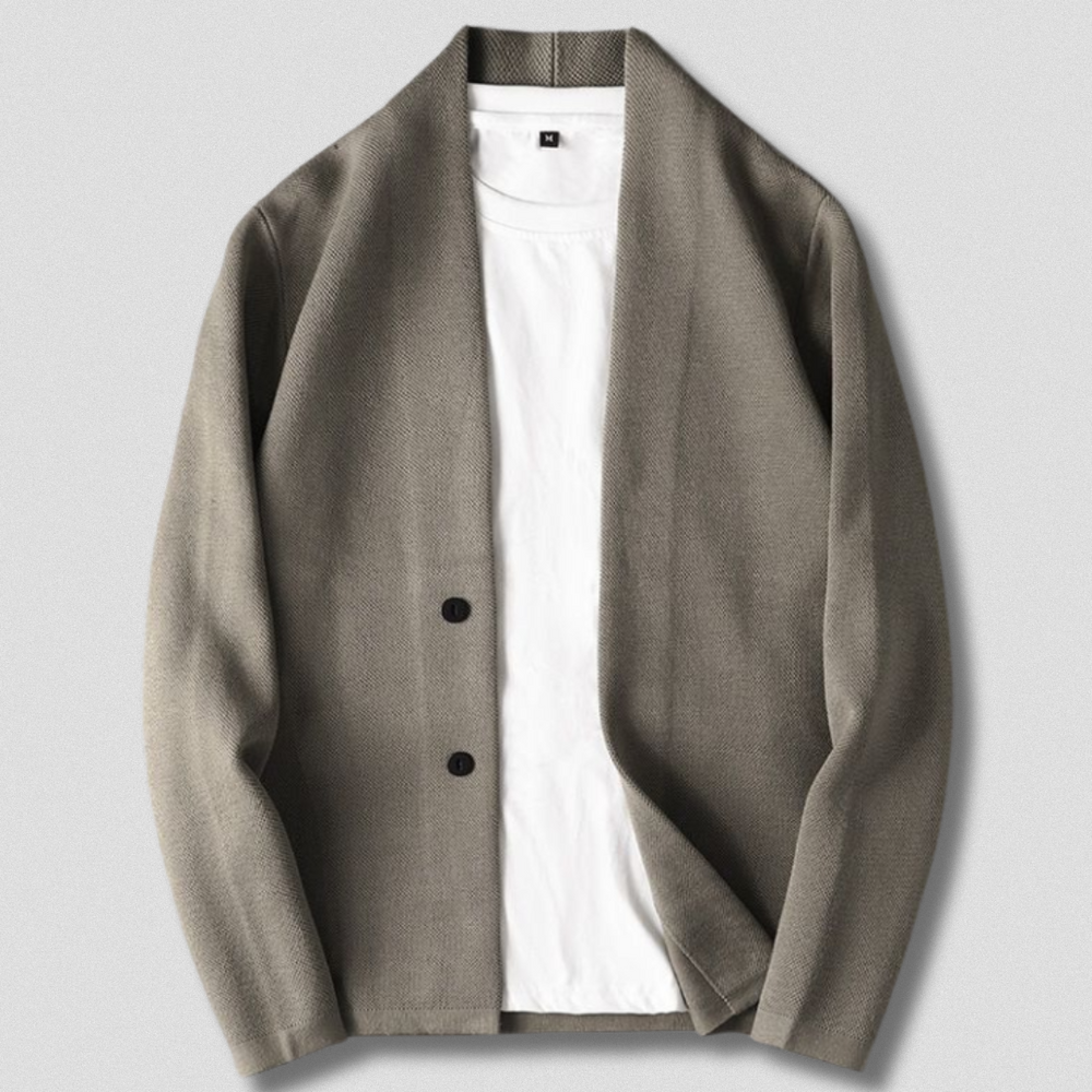 "Grå Johan cardigan i blødt strik med moderne snit, perfekt til både afslappet og formelt herrelook."