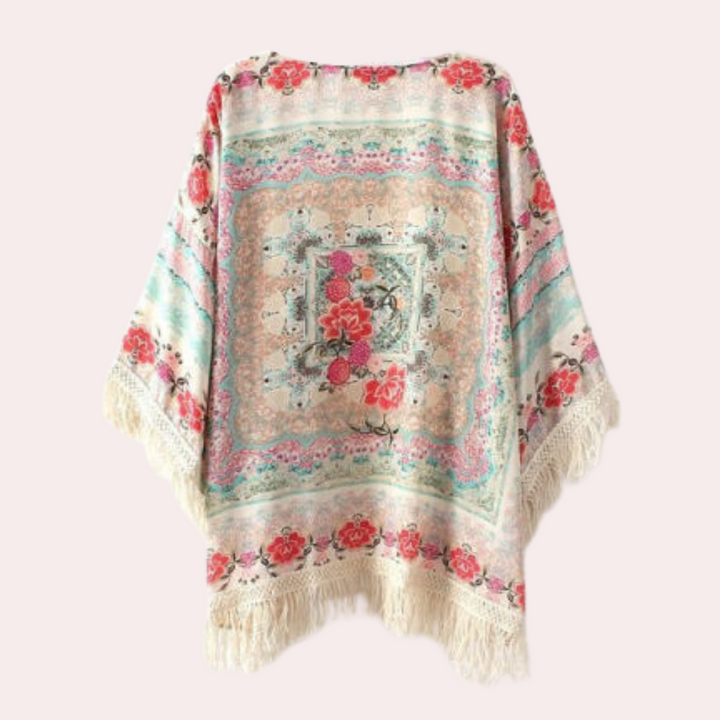 Hvid dame cardigan med boheme blomsterdesign, løs pasform. Ideel til stilfulde vinterdage.