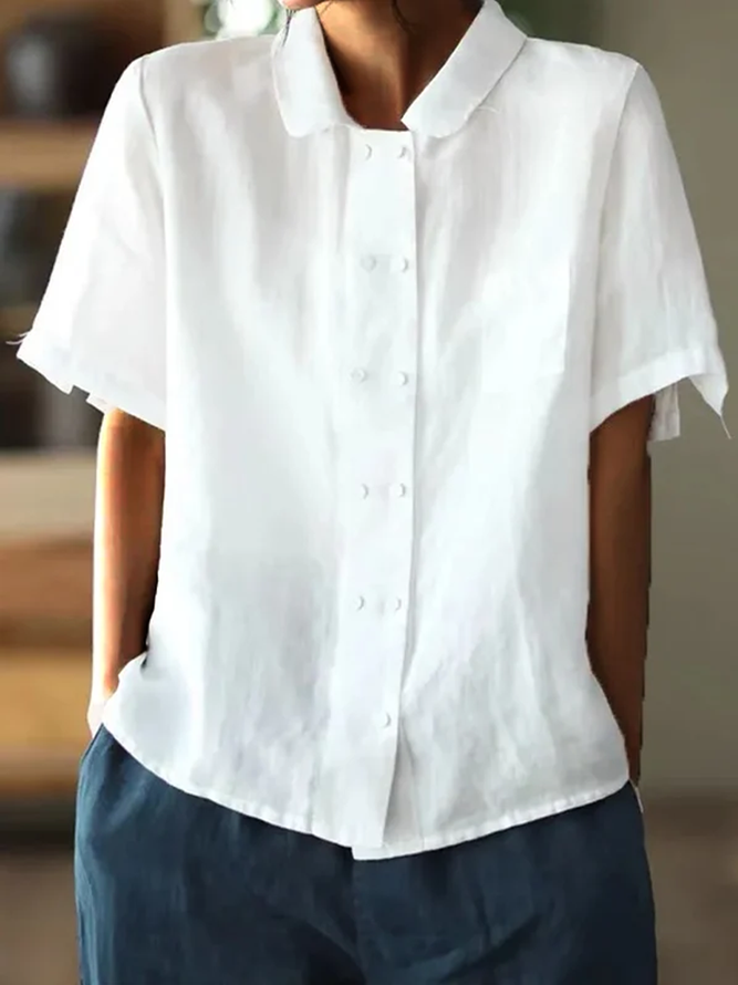 "Hvid løstsiddende bluse i bomuld og hør med korte ærmer, elegant og luftigt design for alsidig sommertøjstil."