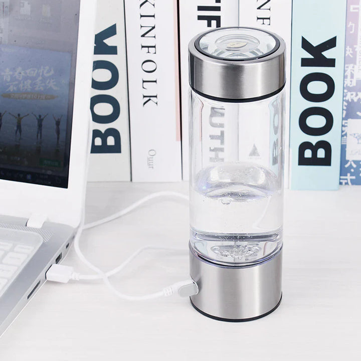 "HydroPure drikkedunk i sølvfinish med brint teknologi, til antioxidant hydrering, elegant og miljøvenligt design."
