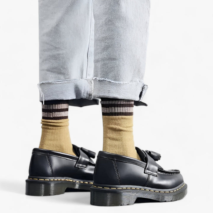 Klassiske herre loafers i brun med kvast, tidløst design og bløde såler, perfekt til både formelle og casual outfits.