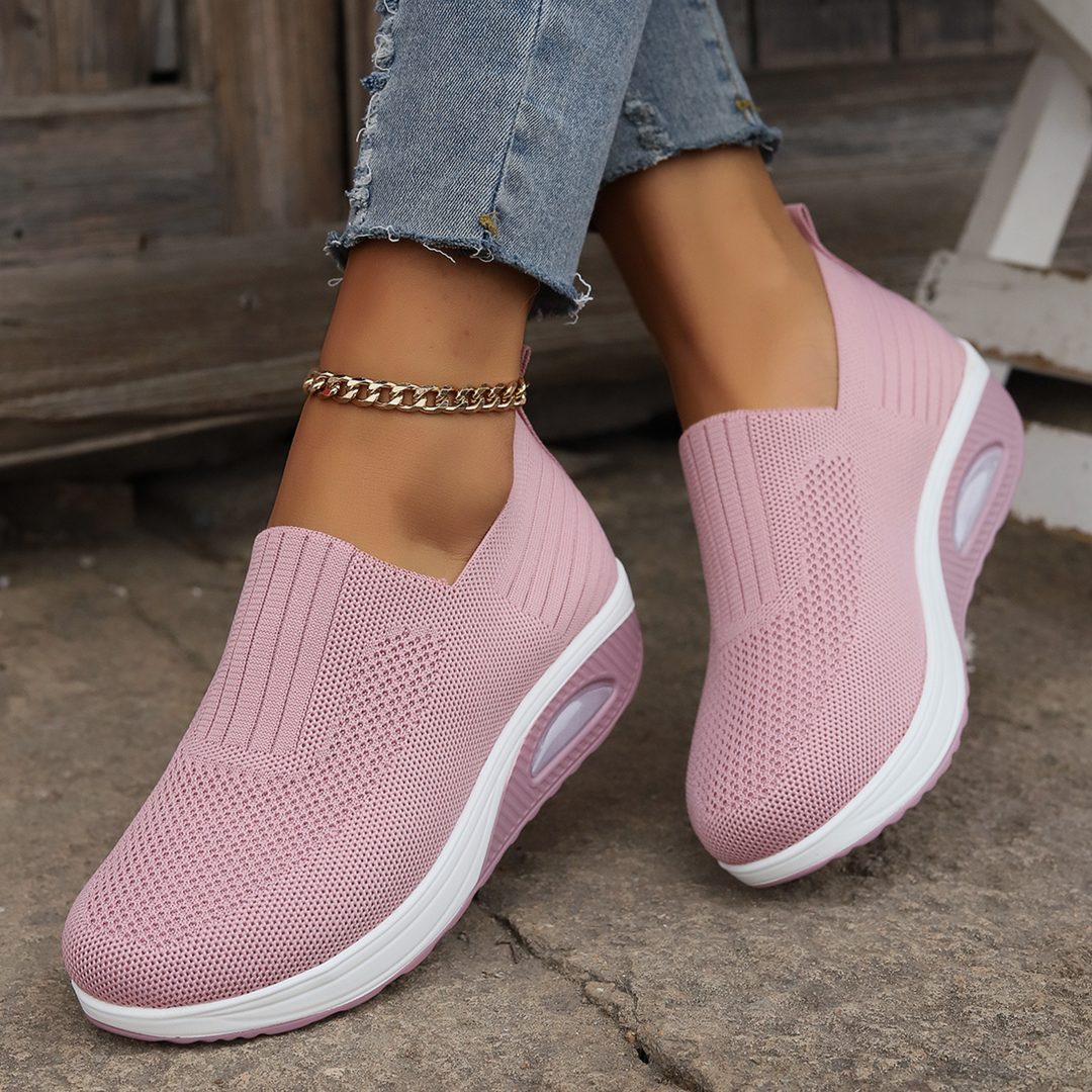 Komfortable slip-on sneakers til kvinder, støttende og åndbare i flere farver, ergonomisk design og skridsikker sål.