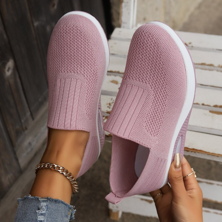 Komfortable slip-on sneakers til kvinder, støttende og åndbare i flere farver, ergonomisk design og skridsikker sål.