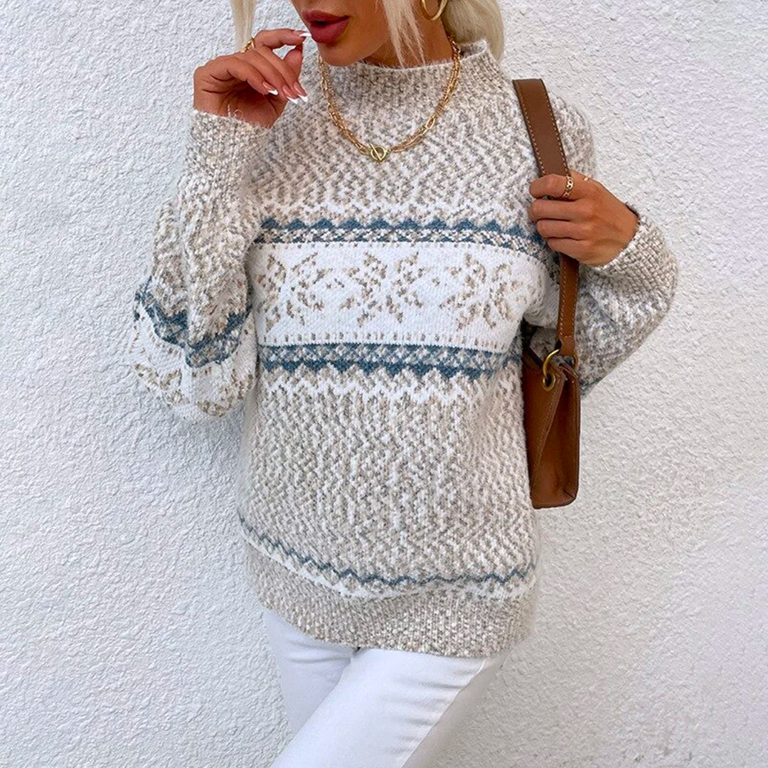 Stilfuld dame sweater i varm nordisk strik med rund hals, ideel til hygge og vintermode.