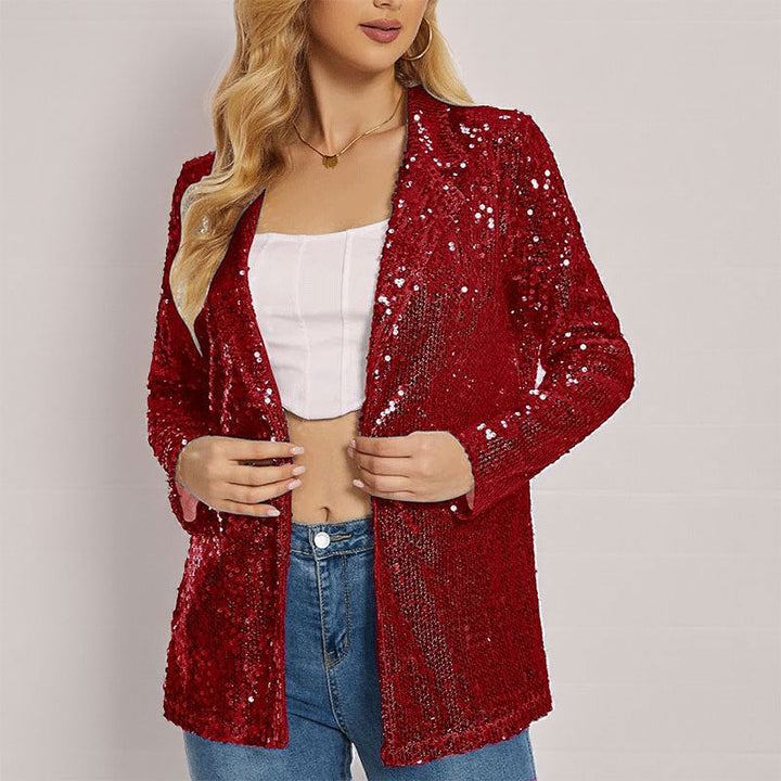 Festlig kvindeblazer dækket af pailletter, perfekt som partytøj for et glamourøst look til enhver fest.