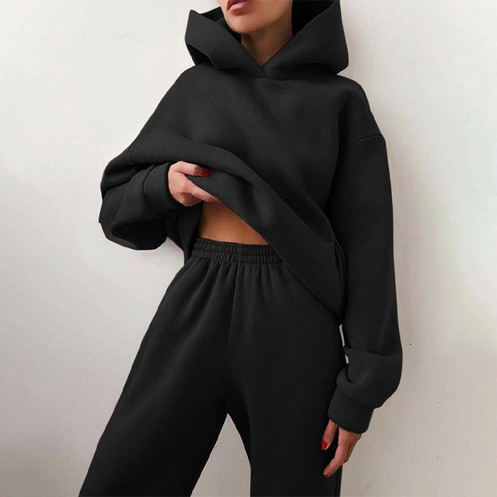 Kvinders XXL jogging sæt med pullover og joggingbuks, ideelt til komfort og afslapning derhjemme.