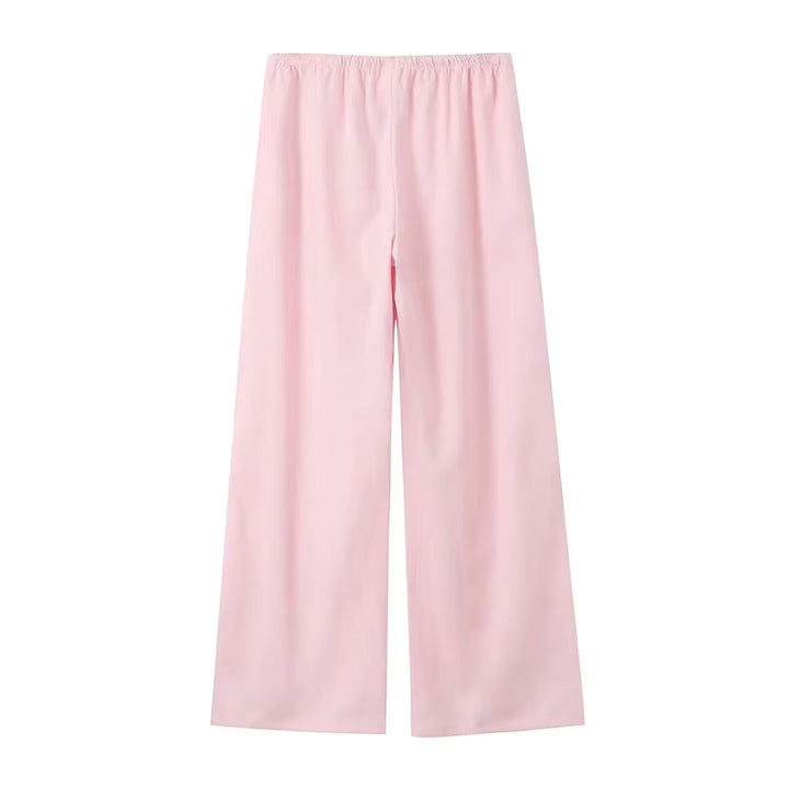 Enkelt og elegant, løst damesæt med wide leg bukser til enhver stil.