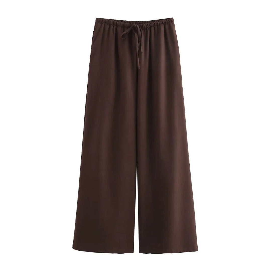 Damejakkesæt med trendy wide leg bukser og løs pasform.