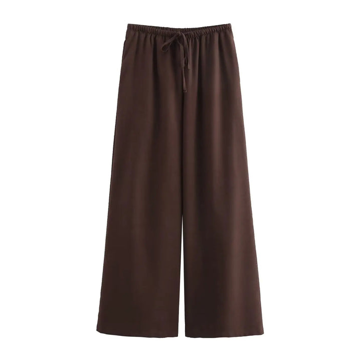 Damejakkesæt med trendy wide leg bukser og løs pasform.