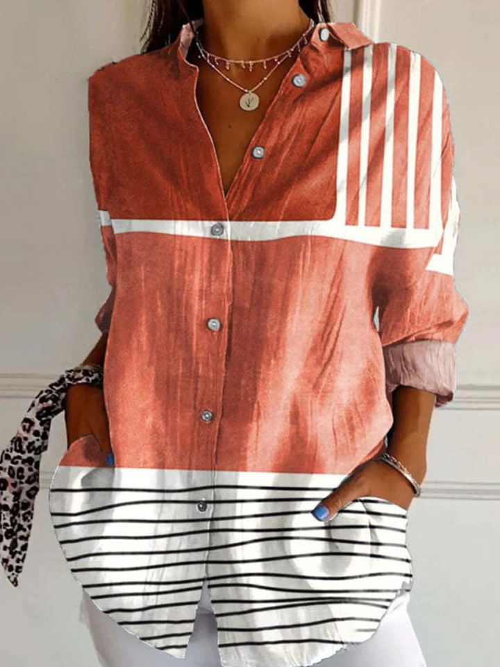Kvinder stribet bluse med knaplukning. Alsidig langærmet skjorte til hverdag, kontor og mode. Elegant look.