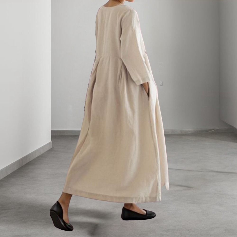 "Løs pasform kjole i gul brun, langærmet, med lommer, åndbar, ideel til hverdag og forskellige anledninger."