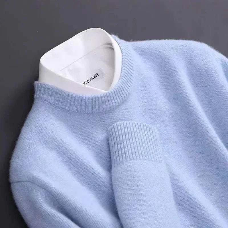 Luksuriøs cashmere trøje til kvinder, viser stilrent design i lys beige farve, ideel til både hverdag og fest.