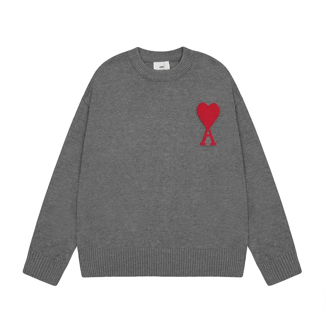 "Luksuriøs unisex uldpullover med ikonisk hjerte-design, minimalistisk grafik og super komfort til både mænd og kvinder."