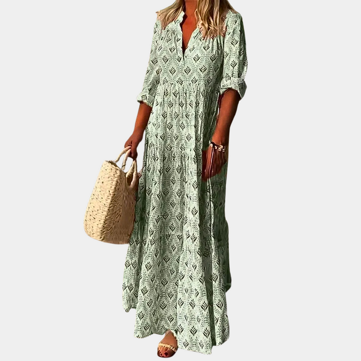 Elegant sommerkjole til kvinder, i lyserød farve, designet for lethed og komfort.