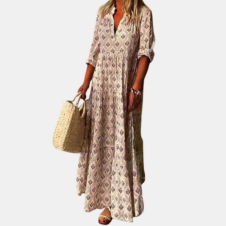 Elegant sommerkjole til kvinder, i lyserød farve, designet for lethed og komfort.